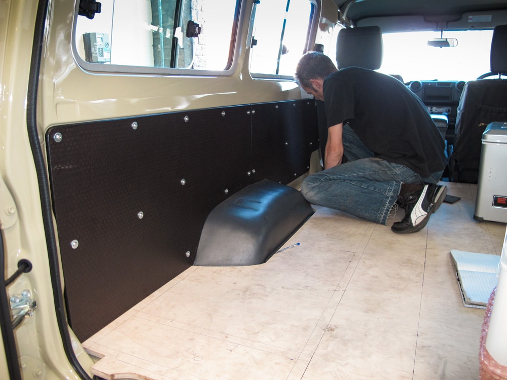 Installing the floor and interior during camper conversion of a Land Cruiser 78 Troopy
