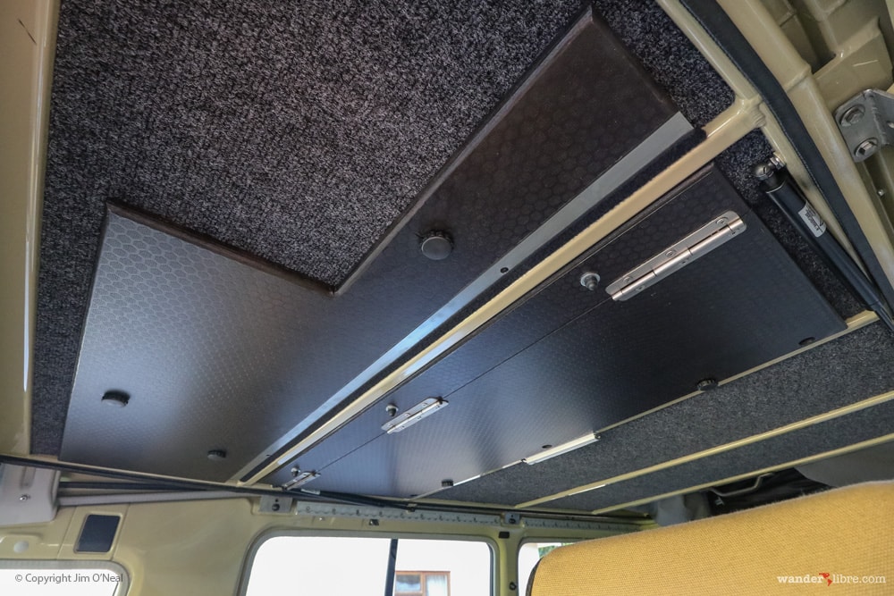 Drop-down Cargo Barrier Between Front and Rear Cabins in Land Cruiser Tiny Home