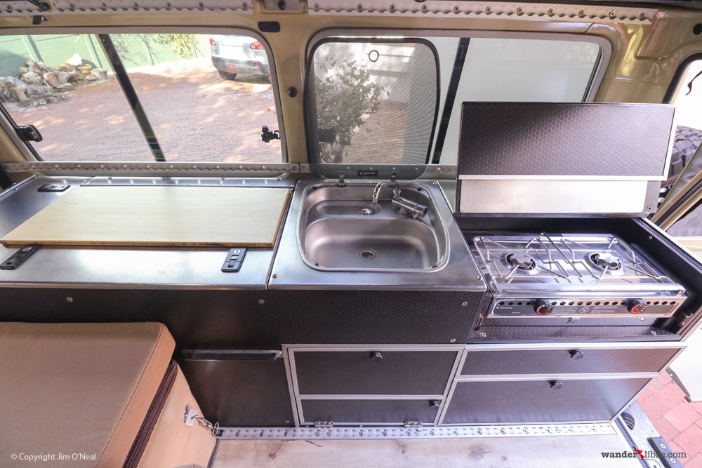 Land Cruiser Tiny Home Kitchen w/ Stainless Steel Counters, Sink, & Marine Alcohol Stove