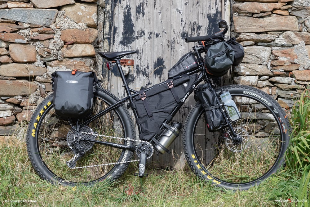 The Surly ECR w/ bikepacking frame bag, bikepacking saddle bag, bikepacking handlebar bag, bikepacking rack, bikepacking bags