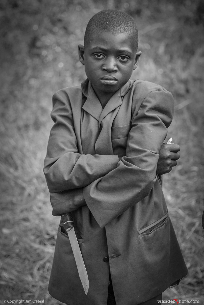 Portrait of a boy with his knife, Cameroon