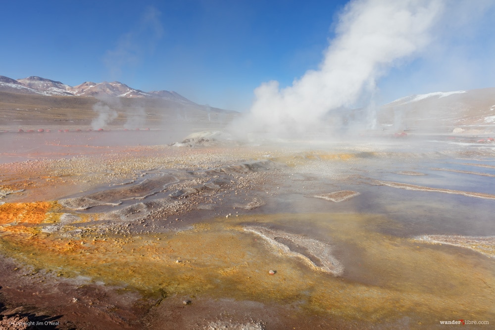 A photo of El Tatio Geyser taken shortly after sunrise in the Andes Mountains of Chile