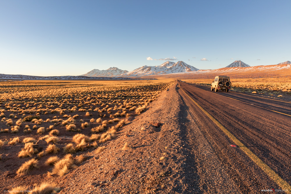 A portrait of Maggie, our Land Cruiser Troopy, traveling late in the afternoon across the high plateau south of San Pedro de Atacama, Chile.