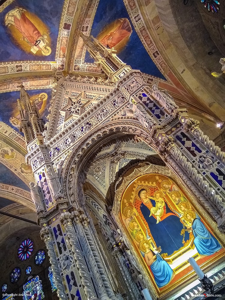A photograph of the interior of Church and Museum Orsanmichele in Florence, Italy.