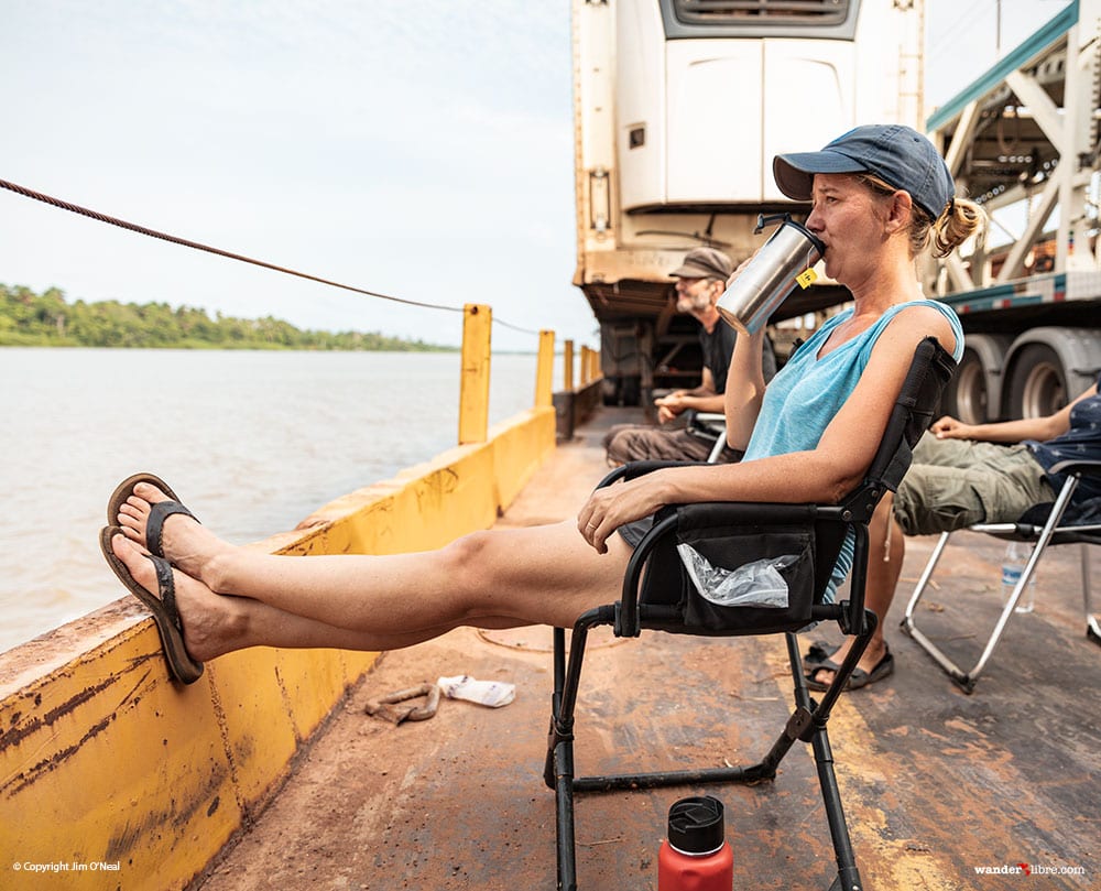 Sitting in a Front Runner Expander Chair while traveling down the Amazon on a barge