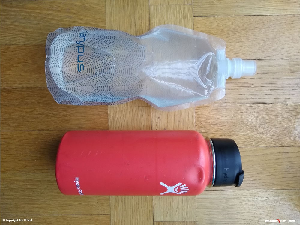 A comparison between the size of a full 1 liter Platypus SoftBottle and 1 liter Hydroflask